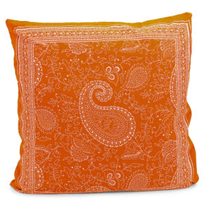 Orange and white paisley/bandana patterned pillow.