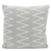 Grey and white zig-zag cushion.