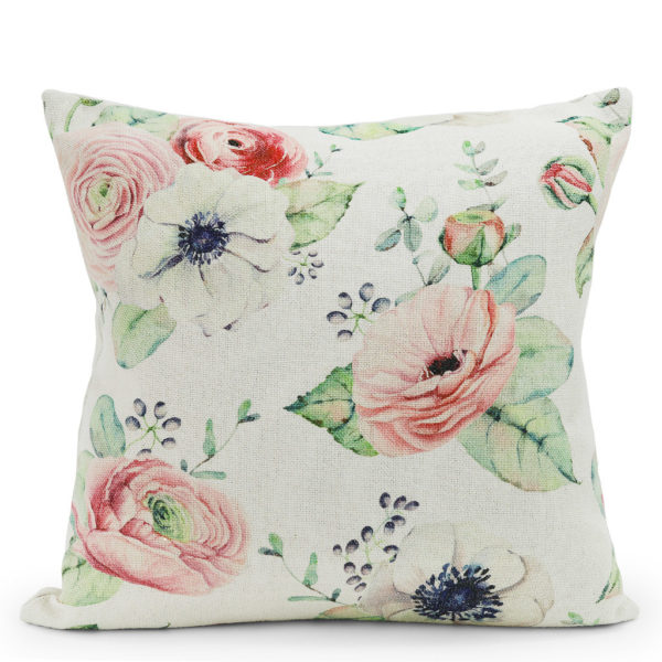 Cream, pink and green floral patterned cushion.