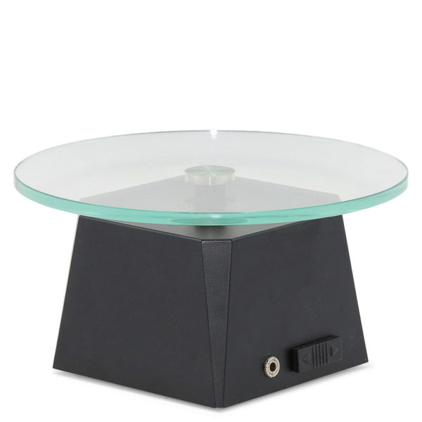 Small glass turntable for displaying items on.