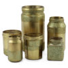 Assorted glass jars painted gold.