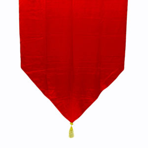 Red satin wall hang with gold tassel on end.