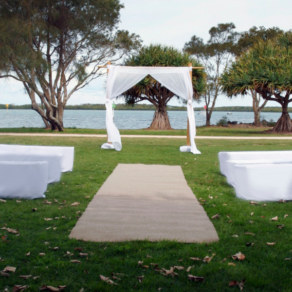 2 post bamboo arbour with white draping.