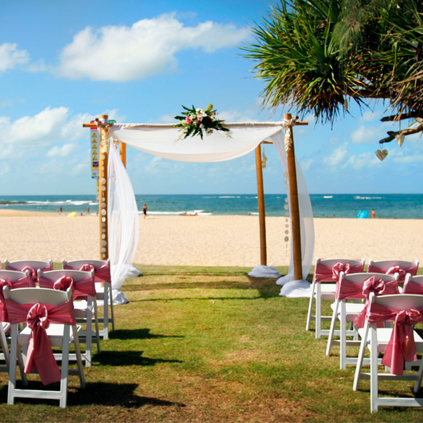 4 post bamboo arbour with white draping. 
Can be used with a matching white cover or just white draping.