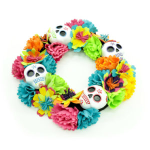 Colourful Mexican style wreath with skulls.