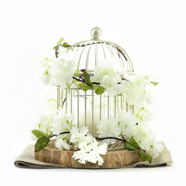Vintage birdcage and flowers centrepiece.