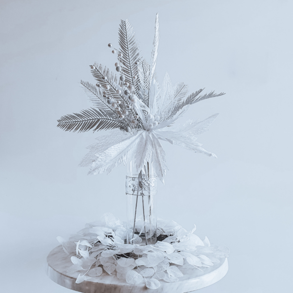 Elegant silver leaf Christmas centrepiece.
