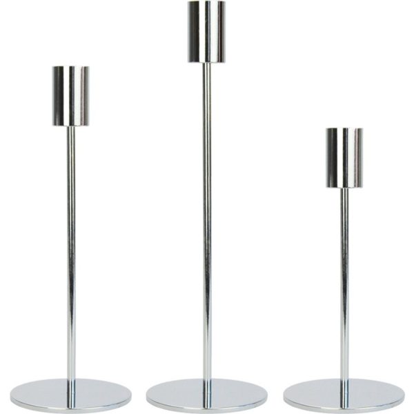 Chrome silver candle holder set, perfect for taper candles. Hire this set of 3 for your next dinner party or celebration!